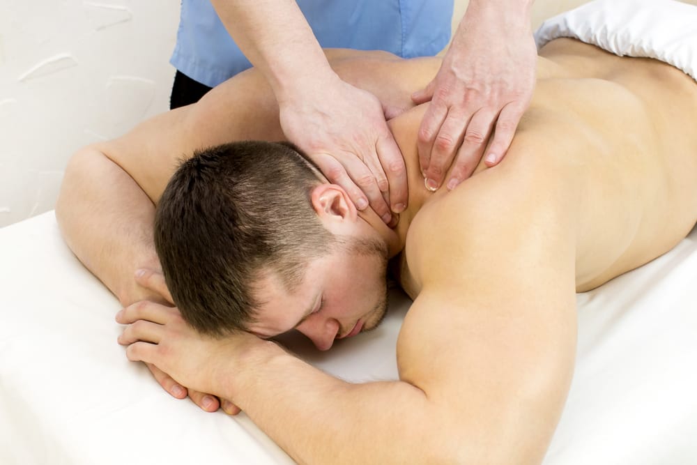 Man receiving massage therapy